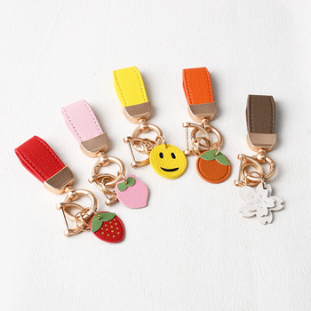 Νέο μίνι γαλλικό δαχτυλίδι μπρελόκ από δέρμα προβάτου, μικρό φρέσκο δημιουργικό χαριτωμένο κοντό κρεμαστό μπρελόκ, μικρό κόσμημα