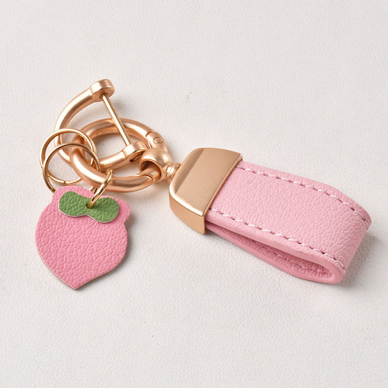 Új mini francia báránybőr kulcstartó, kicsi, friss, kreatív, aranyos, rövid kulcstartó medál, apró ékszer