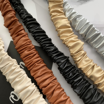 Spot nagykereskedelmi őszi és téli új öv Női egyszerű Joker rugalmas széles övvel díszített kabát Tide