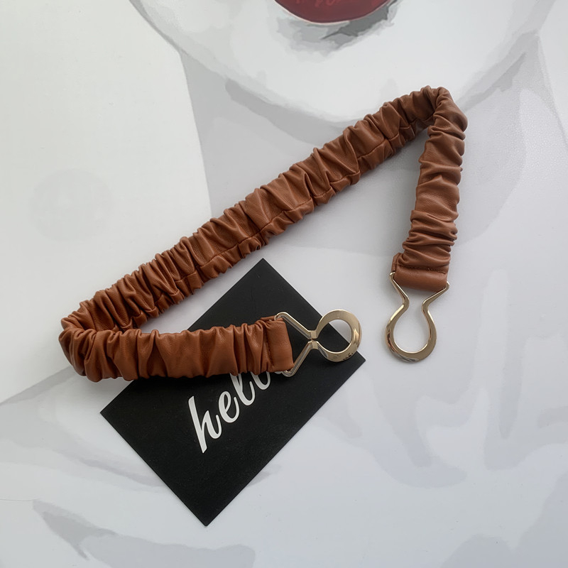 Spot nagykereskedelmi őszi és téli új öv Női egyszerű Joker rugalmas széles övvel díszített kabát Tide