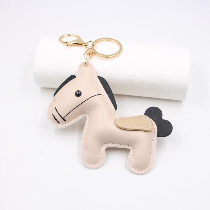 Trendi márka ló év csúcskategóriás ékszer póni medál ajándék póni autó kulcstartó medál poggyász ruházat kiegészítők