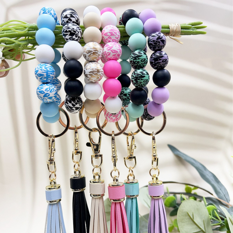 2024 Amazon új színes leopárd gyöngyös karkötő kulcstartó női színes gyöngyös karkötő bojtos medál