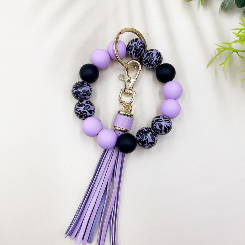 2024 Amazon új színes leopárd gyöngyös karkötő kulcstartó női színes gyöngyös karkötő bojtos medál