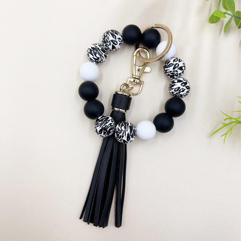 2024 Amazon új színes leopárd gyöngyös karkötő kulcstartó női színes gyöngyös karkötő bojtos medál