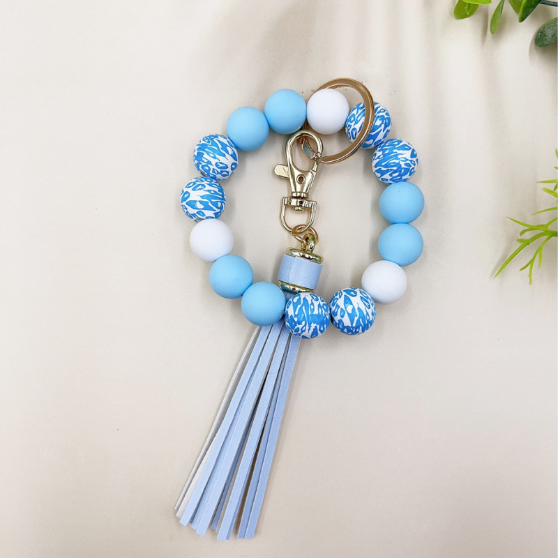 2024 Amazon új színes leopárd gyöngyös karkötő kulcstartó női színes gyöngyös karkötő bojtos medál