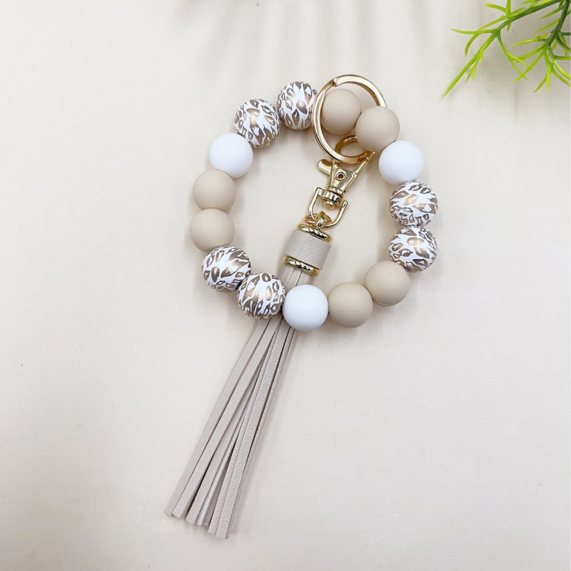 2024 Amazon új színes leopárd gyöngyös karkötő kulcstartó női színes gyöngyös karkötő bojtos medál