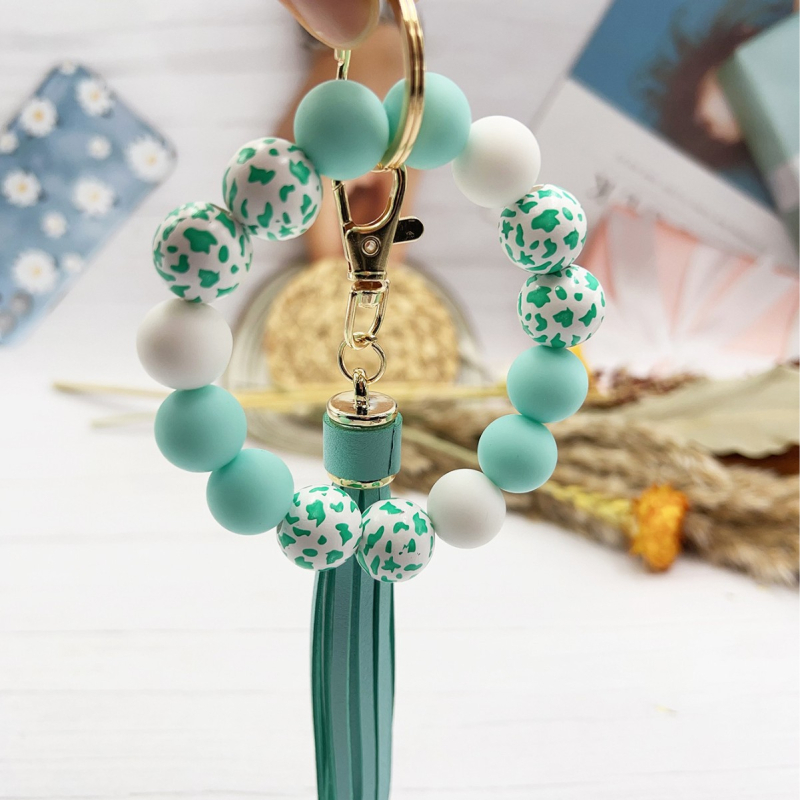 2024 Amazon új színes leopárd gyöngyös karkötő kulcstartó női színes gyöngyös karkötő bojtos medál