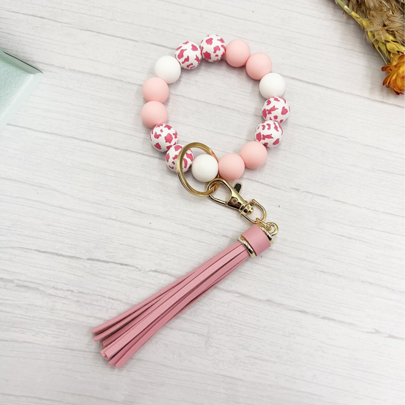 2024 Amazon új színes leopárd gyöngyös karkötő kulcstartó női színes gyöngyös karkötő bojtos medál