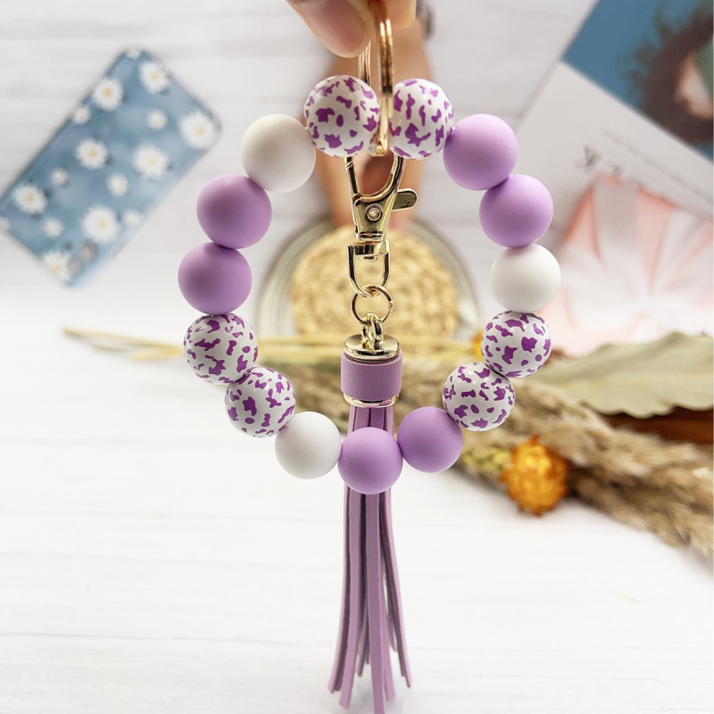 2024 Amazon új színes leopárd gyöngyös karkötő kulcstartó női színes gyöngyös karkötő bojtos medál