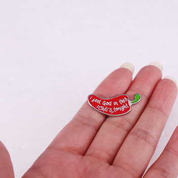 Amerikai tévés iroda vicces epizódja, Parm pirospaprikás bross jelvény