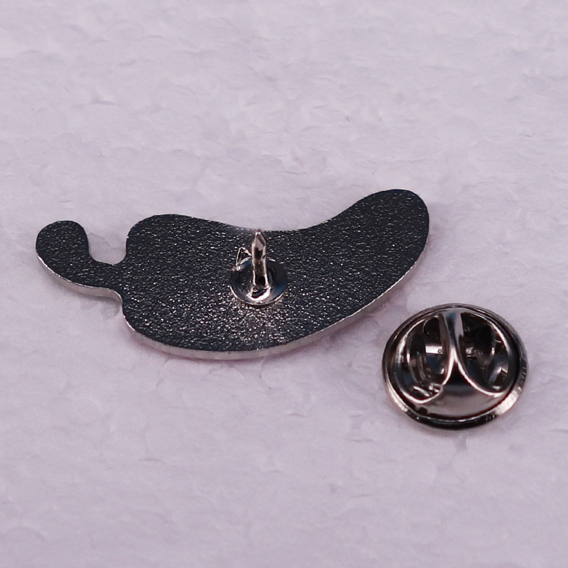 Amerikai tévés iroda vicces epizódja, Parm pirospaprikás bross jelvény