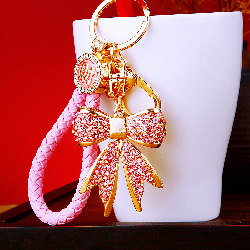 Gyémánt masnis autós kulcstartó fém aranyos női táska medál kulcstartó gyűrű függő kiegészítők üzleti ajándékok