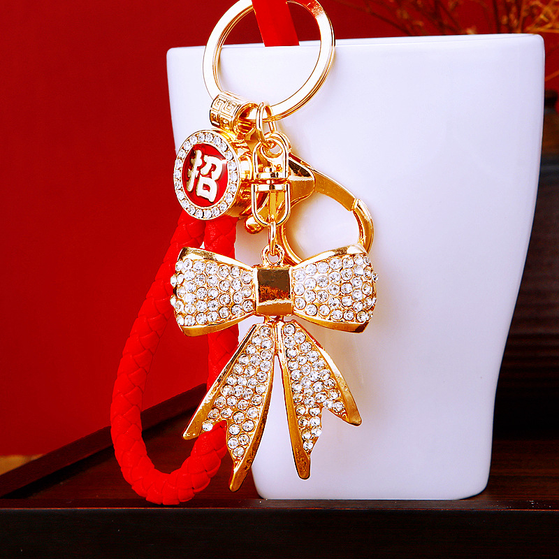 Gyémánt masnis autós kulcstartó fém aranyos női táska medál kulcstartó gyűrű függő kiegészítők üzleti ajándékok