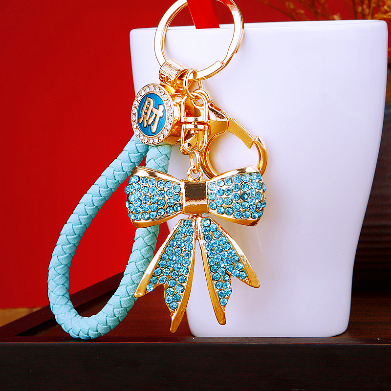 Gyémánt masnis autós kulcstartó fém aranyos női táska medál kulcstartó gyűrű függő kiegészítők üzleti ajándékok