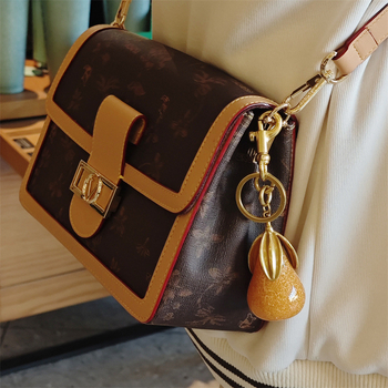 Gamyklinis tiesioginis aukso kriaušės raktų pakabuko pakabukas, mados asmenybės krepšys, pakabukas, raktų žiedo aksesuarai