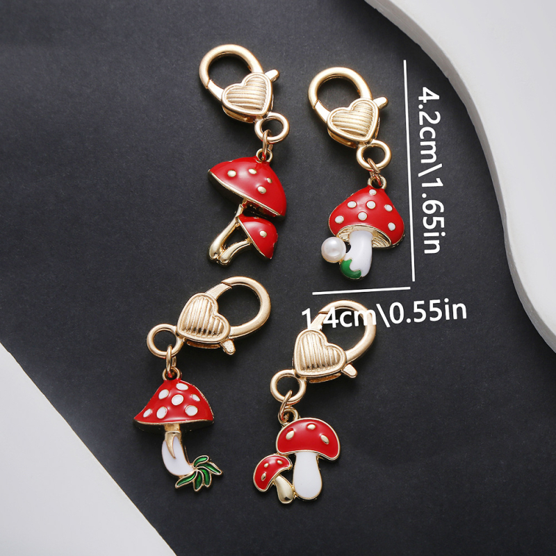 Határokon átnyúló forró olajcsepp alakú piros aranyos rajzfilm kis gomba medál szerelmes kulcstartó hátizsák autó ékszer medál