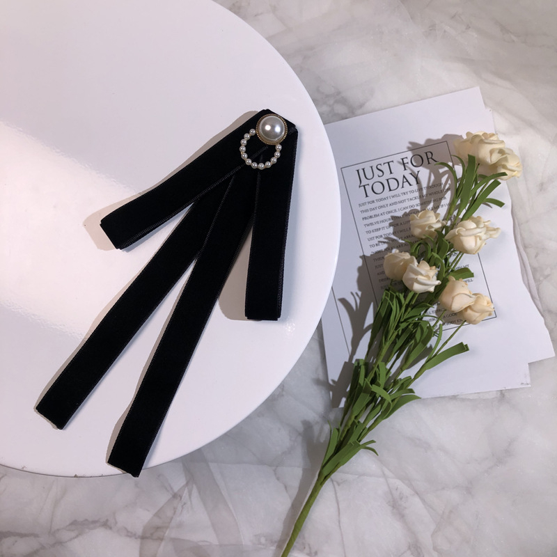 Väike hulgimüük Lõuna-Korea paelaga ühevärviline pärlmutter sametist lipsuga tööriistakrae lillelise lipsuga naiste dressipluus