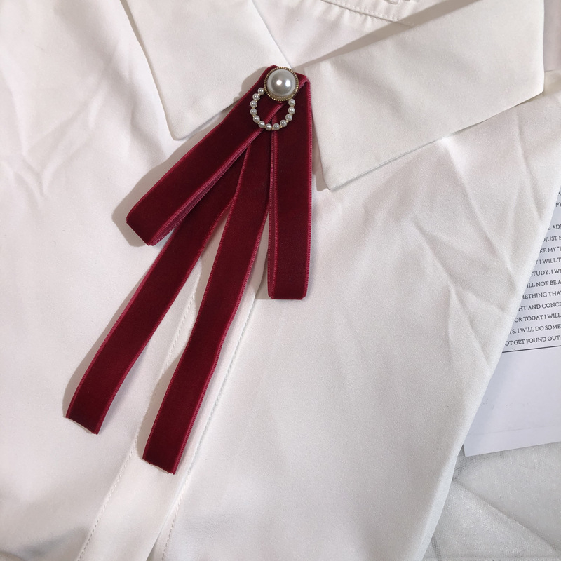 Väike hulgimüük Lõuna-Korea paelaga ühevärviline pärlmutter sametist lipsuga tööriistakrae lillelise lipsuga naiste dressipluus