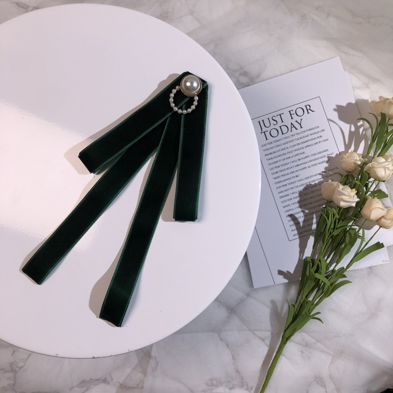 Väike hulgimüük Lõuna-Korea paelaga ühevärviline pärlmutter sametist lipsuga tööriistakrae lillelise lipsuga naiste dressipluus