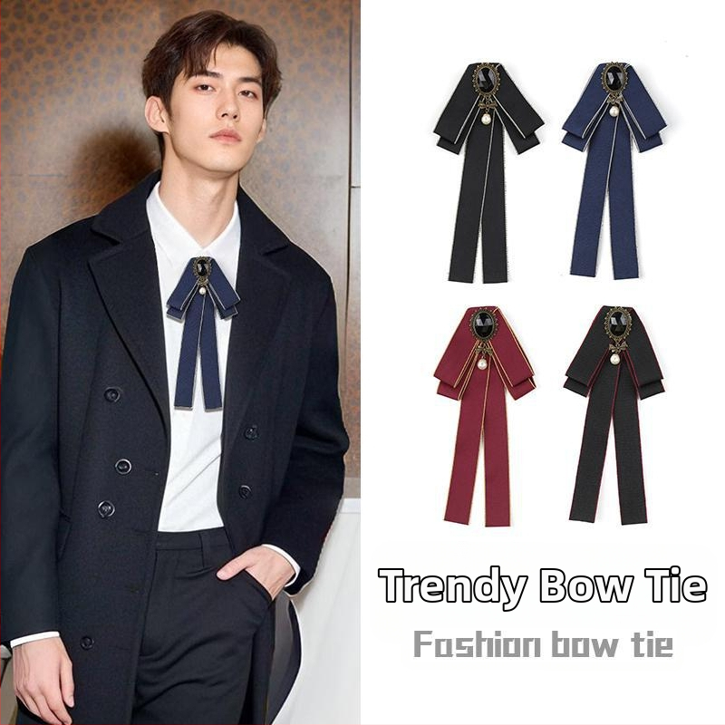 Meeste kikilips peigmehe isamehe pulmahotelli pulmaperemehe ärikoka musta ülikonna lipsuga aksessuaarid