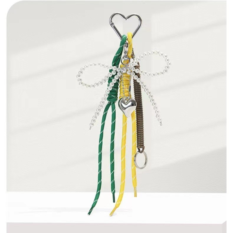 Niche személyiségű autós kulcstartó, blogger stílusú, ugyanolyan stílusú táska, medál, Miu stílusú, szőtt nyakpántos táska, függő női pillangó