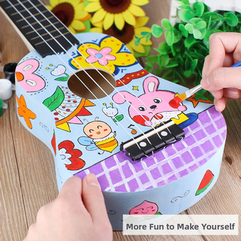 isetehtud väike kitarr lastele 21-tolline ukulele käsitöömaterjalist kott puidust muusikariista mänguasi maalitud grafiti hulgimüük