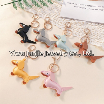 Határokon átnyúló Amazon új PU tacskó kutya kulcstartó kézi kötél táska függő baba kézitáska dekoratív bőr medál Tide