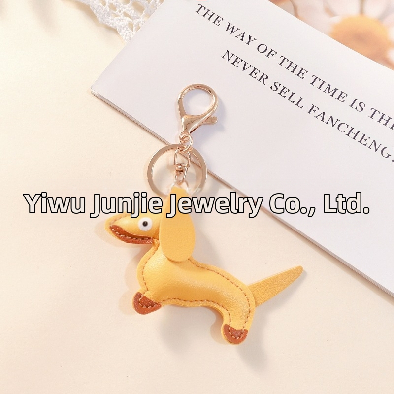 Határokon átnyúló Amazon új PU tacskó kutya kulcstartó kézi kötél táska függő baba kézitáska dekoratív bőr medál Tide