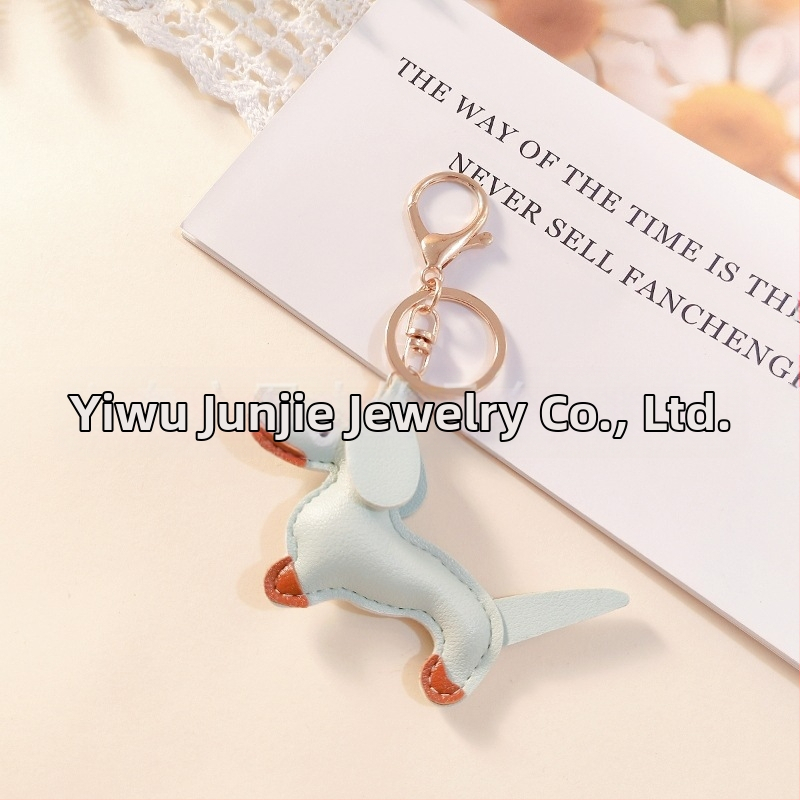 Határokon átnyúló Amazon új PU tacskó kutya kulcstartó kézi kötél táska függő baba kézitáska dekoratív bőr medál Tide