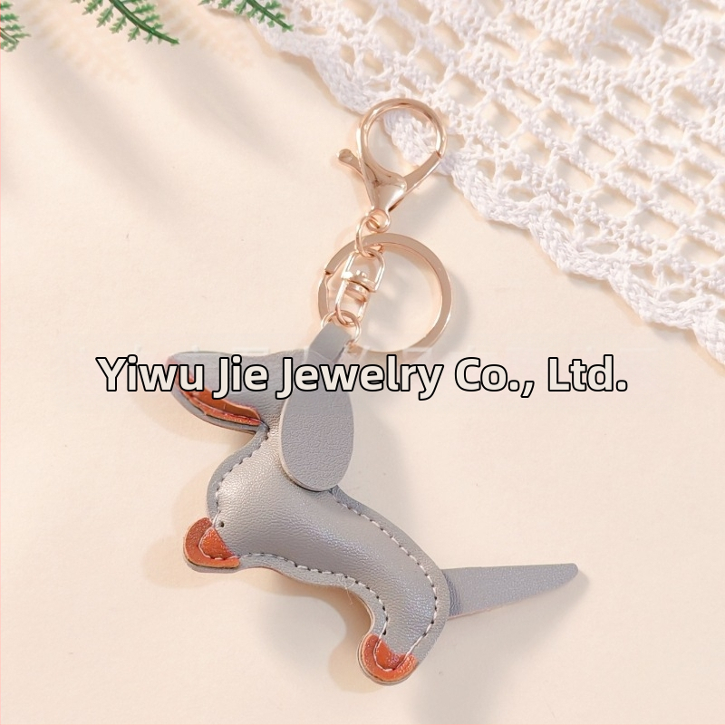 Határokon átnyúló Amazon új PU tacskó kutya kulcstartó kézi kötél táska függő baba kézitáska dekoratív bőr medál Tide