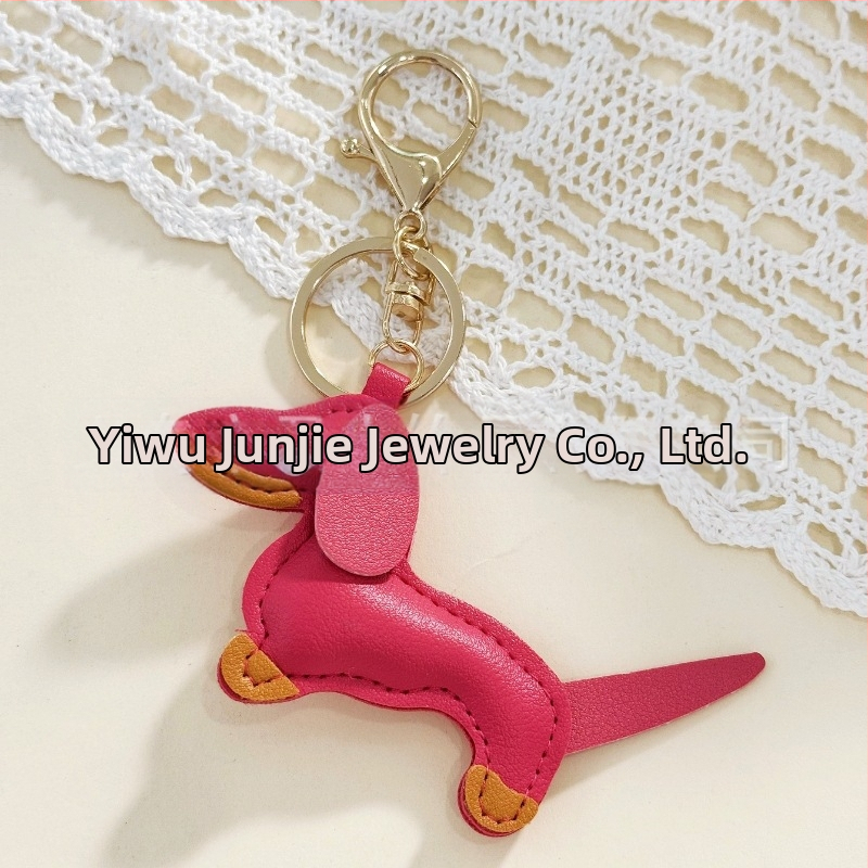 Határokon átnyúló Amazon új PU tacskó kutya kulcstartó kézi kötél táska függő baba kézitáska dekoratív bőr medál Tide