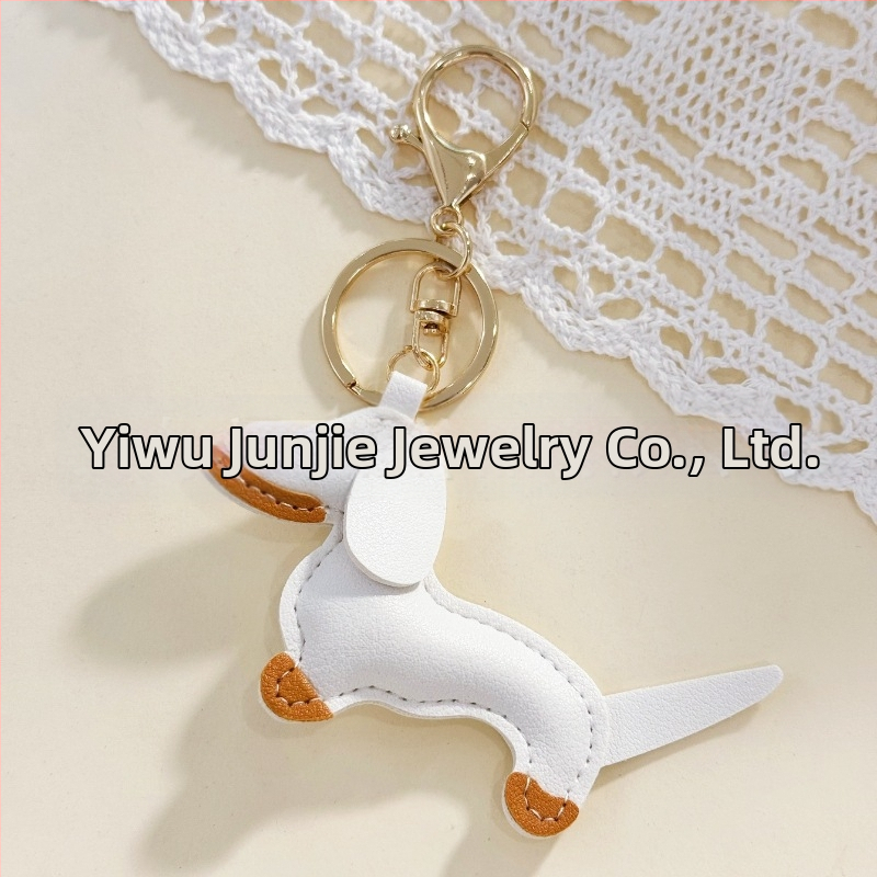 Határokon átnyúló Amazon új PU tacskó kutya kulcstartó kézi kötél táska függő baba kézitáska dekoratív bőr medál Tide