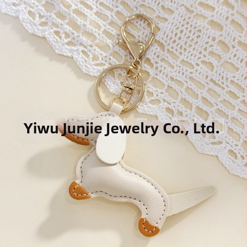 Határokon átnyúló Amazon új PU tacskó kutya kulcstartó kézi kötél táska függő baba kézitáska dekoratív bőr medál Tide