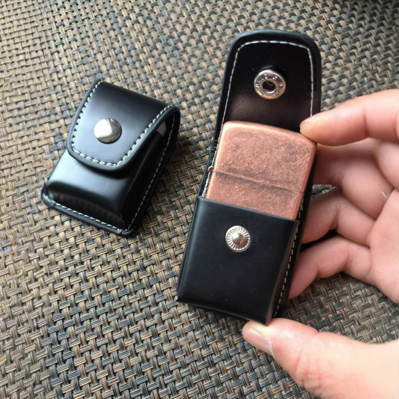 Äri kaasaskantav tulemasin nahkümbris rippuv vööle kinnitatav nahast tulemasina hoiukott ärikingituseks ülikonna nahkümbris