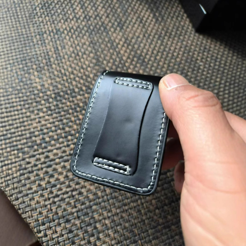 Äri kaasaskantav tulemasin nahkümbris rippuv vööle kinnitatav nahast tulemasina hoiukott ärikingituseks ülikonna nahkümbris