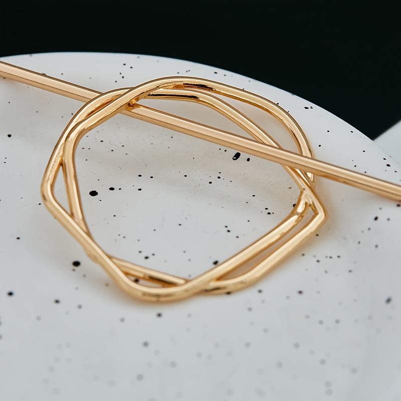 Nauji, paprasti, netaisyklingi, ilgų plaukų segtukai, dvigubos šakutės, lygios metalinės, apvalios.