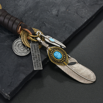 Határokon átnyúló türkiz kulcstartó népszerű kreatív férfi és női ajándékok ötvözet toll szarv retro szőtt marhabőr medál