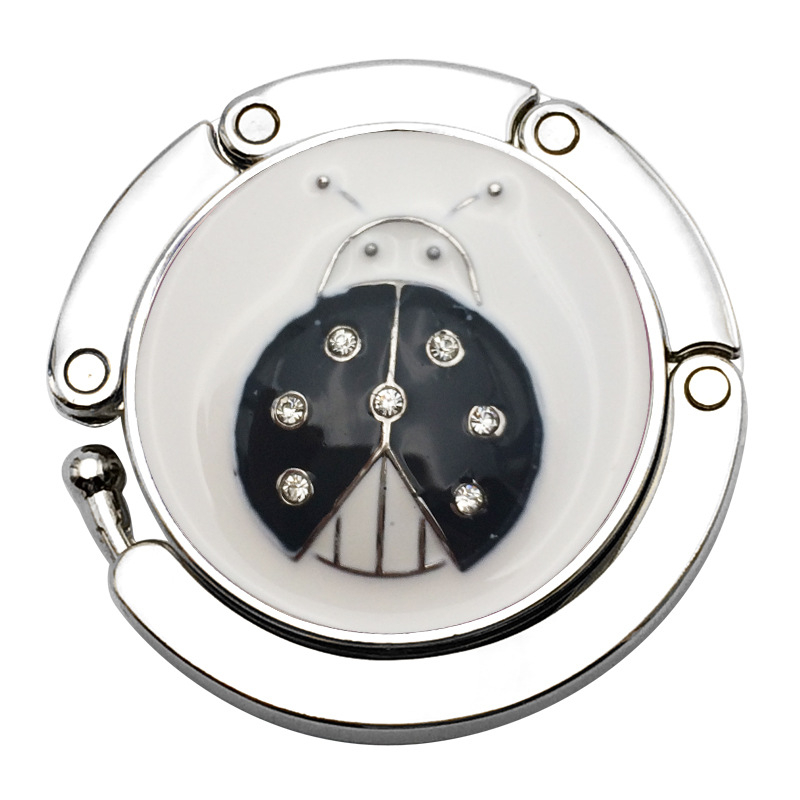 raktáron Összecsukható krémszínű bogárkampó kreatív szkarabeusz táskaakasztó bogár összecsukható hordozható kettős célú női táskaakasztó