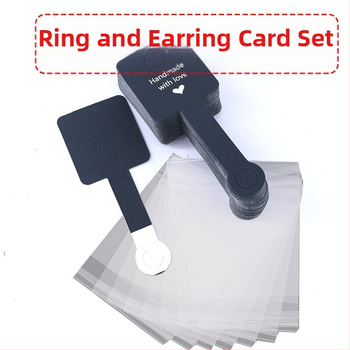 Νέα ασπρόμαυρη καφέ τρίχρωμη πτυσσόμενη κάρτα κοσμημάτων με δαχτυλίδι από καουτσούκ, κρεμάστρα μαλλιών, ταινία για τα μαλλιά, συσκευασία κοσμημάτων με πτυσσόμενη κάρτα