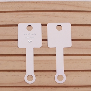 Νέα ασπρόμαυρη καφέ τρίχρωμη πτυσσόμενη κάρτα κοσμημάτων με δαχτυλίδι από καουτσούκ, κρεμάστρα μαλλιών, ταινία για τα μαλλιά, συσκευασία κοσμημάτων με πτυσσόμενη κάρτα