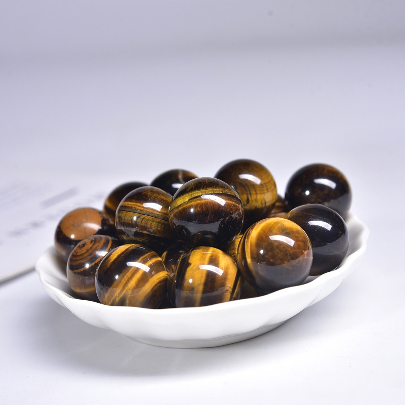 Természetes sárga tigrisszem kő kristálygömb kézilabda fogantyú macskaszem kristálygömb kézműves díszek határokon átnyúló nagykereskedelem
