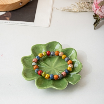 Piiriülene loominguline keraamiline ehtetaldrik neljalehelise ristiku stiilis kerge luksuslik väärtuslik ehtealus keraamiline kodumeisterdus