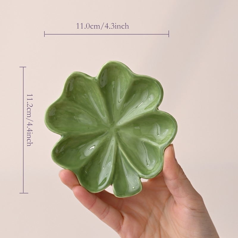 Piiriülene loominguline keraamiline ehtetaldrik neljalehelise ristiku stiilis kerge luksuslik väärtuslik ehtealus keraamiline kodumeisterdus