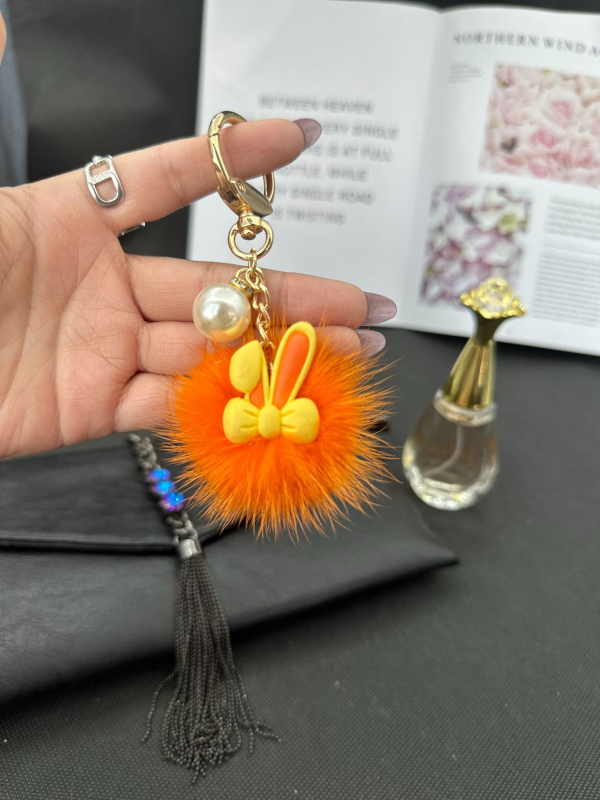 Igazi nercszőrből készült aranyos nyúl autós kulcstartó medál dél-koreai plüss baba babatáskában függő díszek