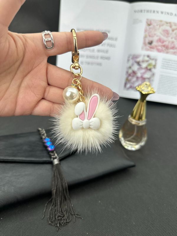 Igazi nercszőrből készült aranyos nyúl autós kulcstartó medál dél-koreai plüss baba babatáskában függő díszek