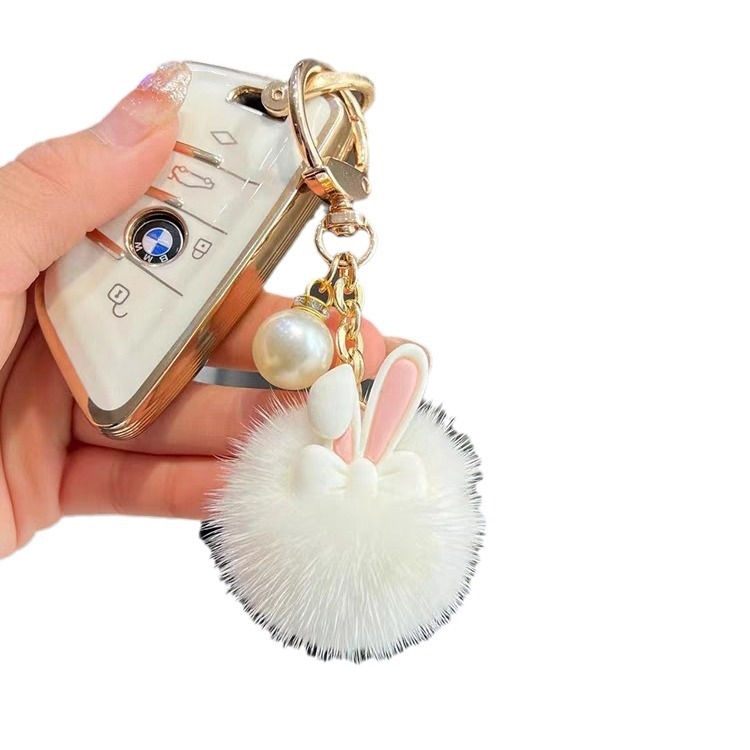 Igazi nercszőrből készült aranyos nyúl autós kulcstartó medál dél-koreai plüss baba babatáskában függő díszek