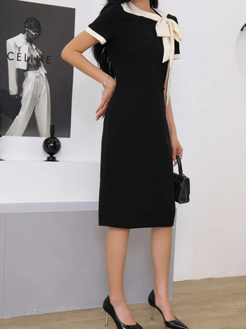 Határokon átnyúló európai és amerikai új női kerek nyakú, masnival díszített, kontrasztos színű, karcsúsított ruha, hírességek parti-bankett ruhájával