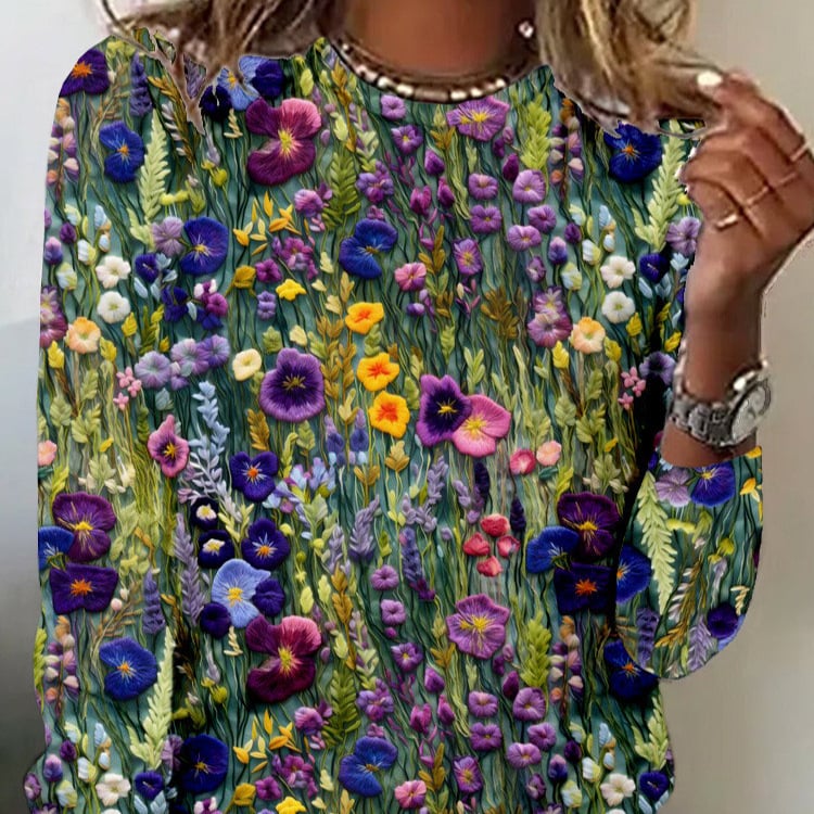 Нова дамска тениска с дълъг ръкав и кръгло деколте от Amazon през 2025 г., с флорални елементи, продавана от независима станция в Европа и Съединените щати.