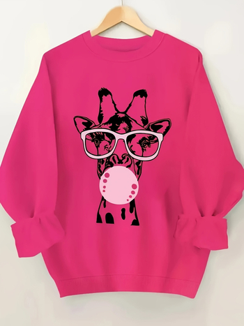 Hosszú ujjú, kerek nyakú, lezser pulóver, zsiráfmintával