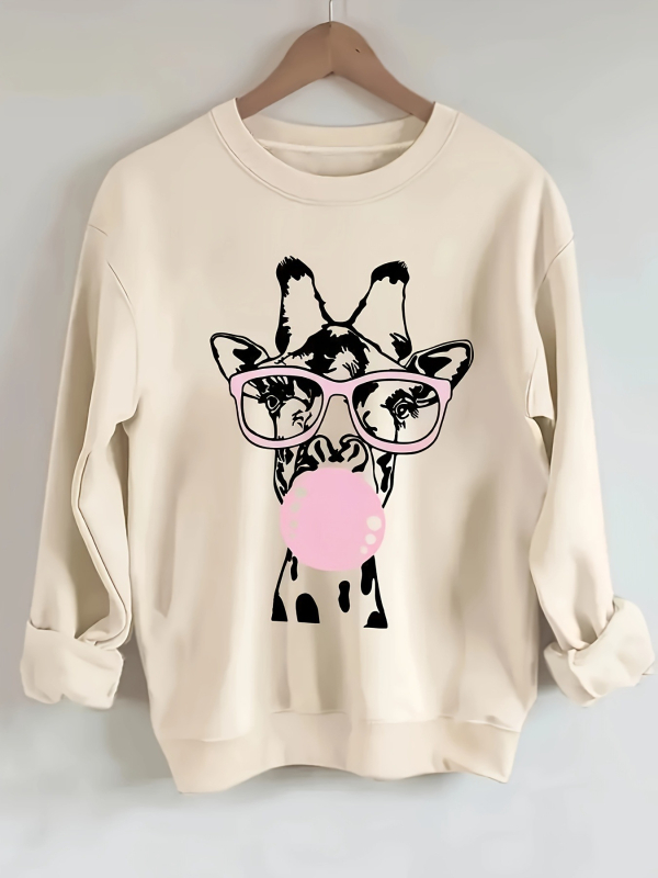 Hosszú ujjú, kerek nyakú, lezser pulóver, zsiráfmintával